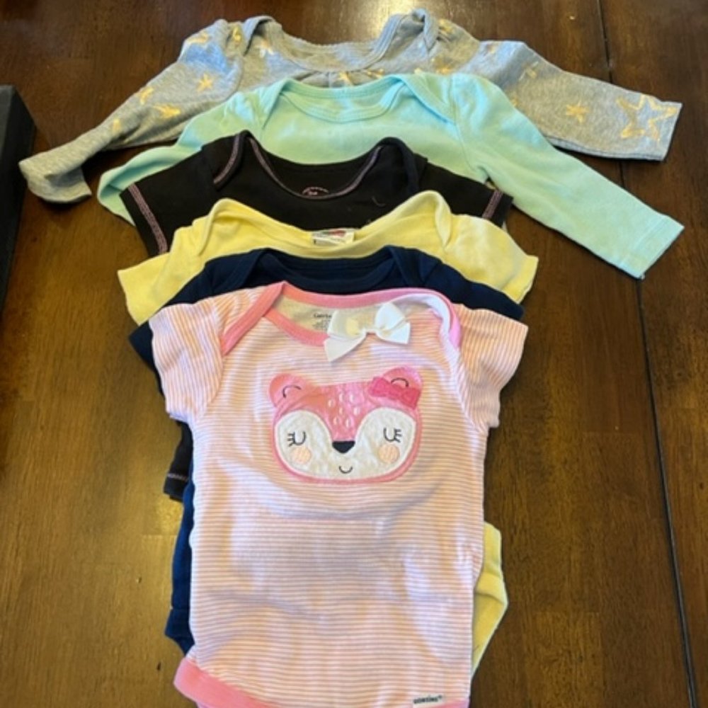 SIX (6) onesies all size 6-9 months, various brands and sleeve sizes